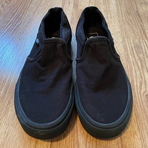 Woman’s black vans